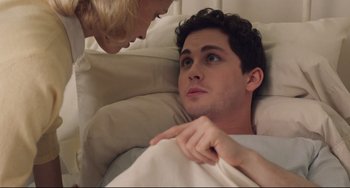 Movie still from “Indignation” (2016), directed by James Schamus – A man and a woman laying in a bed together; Close Up shot, Over the shoulder angle