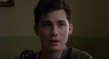 Movie still from “Indignation” (2016), directed by James Schamus – A person wearing a sweater; Close Up shot, Over the shoulder angle