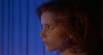 Movie still from “Inferno” (1980), directed by Dario Argento – A person's face in a room; Close Up shot, Low angle