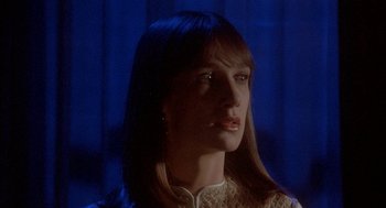 Movie still from “Inferno” (1980), directed by Dario Argento – A person with long hair; Close Up shot, Low angle