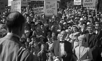 Movie still from “Inherit the Wind” (1960), directed by Stanley Kramer – A large crowd of people are holding signs; Medium shot, High angle