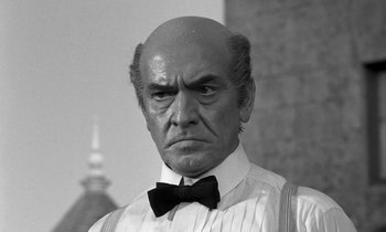 Movie still from “Inherit the Wind” (1960), directed by Stanley Kramer – An older man with a bow tie and a white shirt; Close Up shot, Low angle