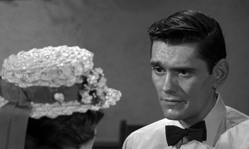 Movie still from “Inherit the Wind” (1960), directed by Stanley Kramer – A man and a woman are looking at each other; Close Up shot, Over the shoulder angle