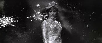 Movie still from “Inside Daisy Clover” (1965), directed by Robert Mulligan – A black and white photo of a woman wearing a hat; Medium shot, Low angle