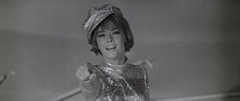 Movie still from “Inside Daisy Clover” (1965), directed by Robert Mulligan – A black and white photo of a woman in a hat; Close Up shot, Low angle