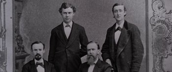 Movie still from “Inside Daisy Clover” (1965), directed by Robert Mulligan – A group of men standing next to each other in suits; Medium shot, Low angle