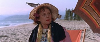 Movie still from “Inside Daisy Clover” (1965), directed by Robert Mulligan – An older woman wearing a straw hat with a bird perched on top of her head; Close Up shot, Low angle