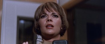 Movie still from “Inside Daisy Clover” (1965), directed by Robert Mulligan – A person with a microphone; Close Up shot, Low angle