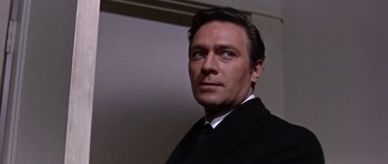Movie still from “Inside Daisy Clover” (1965), directed by Robert Mulligan – A person wearing a suit and tie; Close Up shot, Low angle