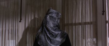 Movie still from “Inside Daisy Clover” (1965), directed by Robert Mulligan – A woman wearing a black and silver veil; Close Up shot, High angle