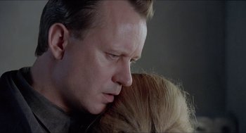 Movie still from “Insomnia” (1997), directed by Erik Skjoldbjærg – A man and a woman's face; Close Up shot, Over the shoulder angle