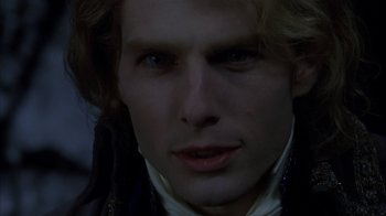 Movie still from “Interview with the Vampire: The Vampire Chronicles” (1994), directed by Neil Jordan – A person with long blonde hair; Close Up shot, Over the shoulder angle
