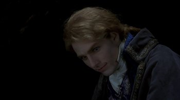 Movie still from “Interview with the Vampire: The Vampire Chronicles” (1994), directed by Neil Jordan – A man with blonde hair and blue eyes; Close Up shot, High angle