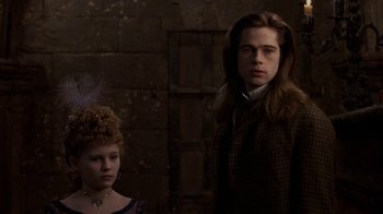 Movie still from “Interview with the Vampire: The Vampire Chronicles” (1994), directed by Neil Jordan – A man and a woman standing next to each other; Medium shot, Low angle