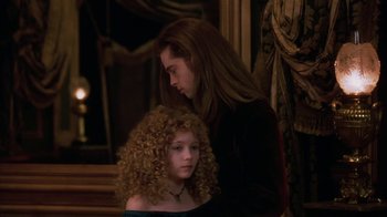 Movie still from “Interview with the Vampire: The Vampire Chronicles” (1994), directed by Neil Jordan – A woman and a young girl are looking at each other; Medium shot, Over the shoulder angle