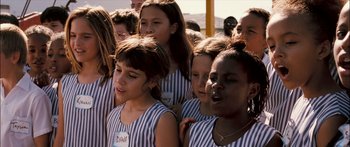 Movie still from “Into the Blue” (2005), directed by John Stockwell – A group of young people standing next to each other; Medium shot, High angle