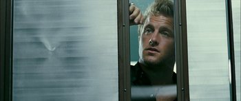 A person looking out of a window