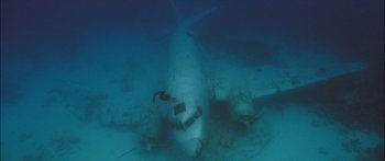 Movie still from “Into the Blue” (2005), directed by John Stockwell – An underwater view of an airplane in the ocean; Extreme Wide shot, High angle