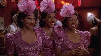 Movie still from “Introducing Dorothy Dandridge” (1999), directed by Martha Coolidge – A group of women wearing pink dresses and hats; Close Up shot, Low angle