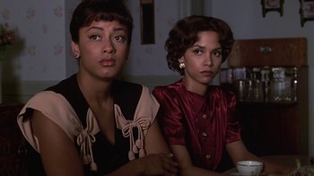 Movie still from “Introducing Dorothy Dandridge” (1999), directed by Martha Coolidge – Two women sitting next to each other at a table; Close Up shot, Over the shoulder angle