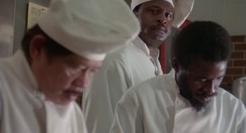 Movie still from “Invasion of the Body Snatchers” (1978), directed by Philip Kaufman – A group of men in white shirts and white hats; Close Up shot, Low angle