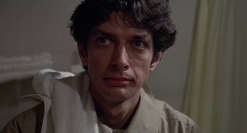 Movie still from “Invasion of the Body Snatchers” (1978), directed by Philip Kaufman – A person with a towel around his neck; Close Up shot, Low angle