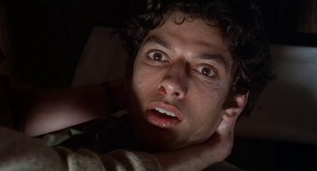 Movie still from “Invasion of the Body Snatchers” (1978), directed by Philip Kaufman – A person laying in a bed; Close Up shot, Low angle