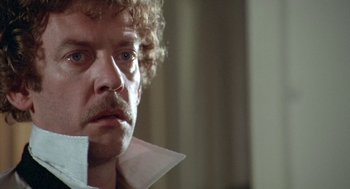 Movie still from “Invasion of the Body Snatchers” (1978), directed by Philip Kaufman – A person wearing a white shirt; Close Up shot, Low angle