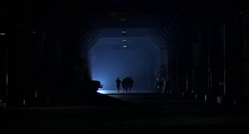 Movie still from “Invasion of the Body Snatchers” (1978), directed by Philip Kaufman – A group of people standing inside of a tunnel; Extreme Wide shot, High angle