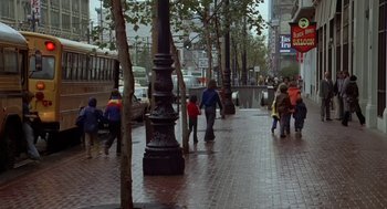 Movie still from “Invasion of the Body Snatchers” (1978), directed by Philip Kaufman – A group of people walking down a sidewalk; Wide shot, High angle