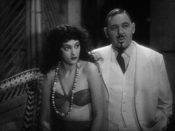 Movie still from “Island of Lost Souls” (1932), directed by Erle C. Kenton – A man and a woman standing next to each other; Close Up shot, Over the shoulder angle