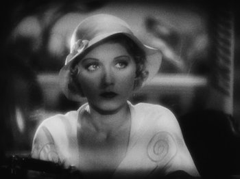 Movie still from “Island of Lost Souls” (1932), directed by Erle C. Kenton – A black - and - white photo of a woman wearing a hat; Close Up shot, High angle