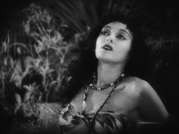Movie still from “Island of Lost Souls” (1932), directed by Erle C. Kenton – A woman with long hair is wearing a bikini; Close Up shot, High angle