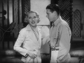 Movie still from “Island of Lost Souls” (1932), directed by Erle C. Kenton – An old black and white photo of a man and a woman; Medium shot, High angle