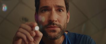 Movie still from “Isn't It Romantic” (2019), directed by Todd Strauss-Schulson – A person with a beard; Extreme Close Up shot, High angle