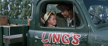 Movie still from “It Happened at the World's Fair” (1963), directed by Norman Taurog – A man and a child in a truck window; Close Up shot, Over the shoulder angle