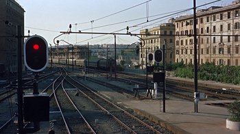 Movie still from “It Started in Naples” (1960), directed by Melville Shavelson – Many trains on the train tracks; Extreme Wide shot, High angle