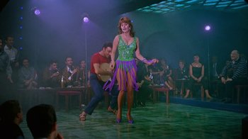 Movie still from “It Started in Naples” (1960), directed by Melville Shavelson – A man and a woman are dancing on a dance floor; Wide shot, Low angle