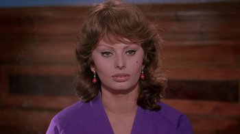 Movie still from “It Started in Naples” (1960), directed by Melville Shavelson – A person wearing a purple shirt; Close Up shot, Low angle