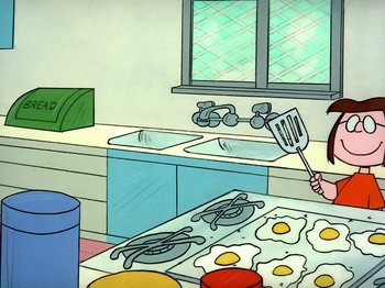 Movie still from “It's the Easter Beagle, Charlie Brown!” (1974), directed by Phil Roman – A cartoon of a woman holding a spatula in a kitchen; Medium shot, High angle