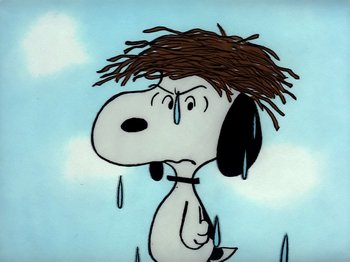 Movie still from “It's the Easter Beagle, Charlie Brown!” (1974), directed by Phil Roman – A drawing of a dog that is crying in the rain; Close Up shot, Low angle