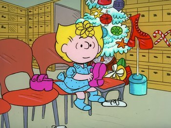 Movie still from “It's the Easter Beagle, Charlie Brown!” (1974), directed by Phil Roman – A drawing of a little girl sitting in front of a christmas tree; Extreme Wide shot, High angle
