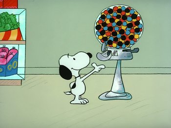 Movie still from “It's the Easter Beagle, Charlie Brown!” (1974), directed by Phil Roman – A cartoon of a dog standing in front of a candy machine; Medium shot, High angle