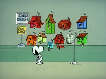 Movie still from “It's the Easter Beagle, Charlie Brown!” (1974), directed by Phil Roman – A cartoon picture of a dog in front of a bunch of birdhouses; Extreme Wide shot, High angle