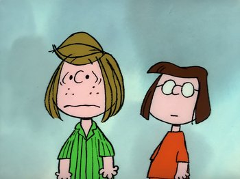 Movie still from “It's the Easter Beagle, Charlie Brown!” (1974), directed by Phil Roman – A cartoon of two women standing next to each other; Medium shot, Low angle