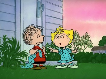 Movie still from “It's the Easter Beagle, Charlie Brown!” (1974), directed by Phil Roman – A couple of people that are standing in the grass; Medium shot, Over the shoulder angle