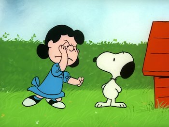 Movie still from “It's the Easter Beagle, Charlie Brown!” (1974), directed by Phil Roman – A cartoon picture of a girl and a dog; Medium shot, High angle