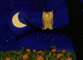 Movie still from “It's the Great Pumpkin, Charlie Brown” (1966), directed by Bill Melendez – An owl sitting on top of a tree branch in front of pumpkins; Wide shot, Low angle