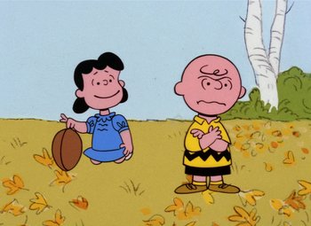Movie still from “It's the Great Pumpkin, Charlie Brown” (1966), directed by Bill Melendez – A charlie brown and a girl in a field; Extreme Wide shot, High angle