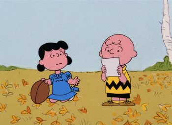 Movie still from “It's the Great Pumpkin, Charlie Brown” (1966), directed by Bill Melendez – A charlie brown and a lucy cartoon character; Extreme Wide shot, High angle